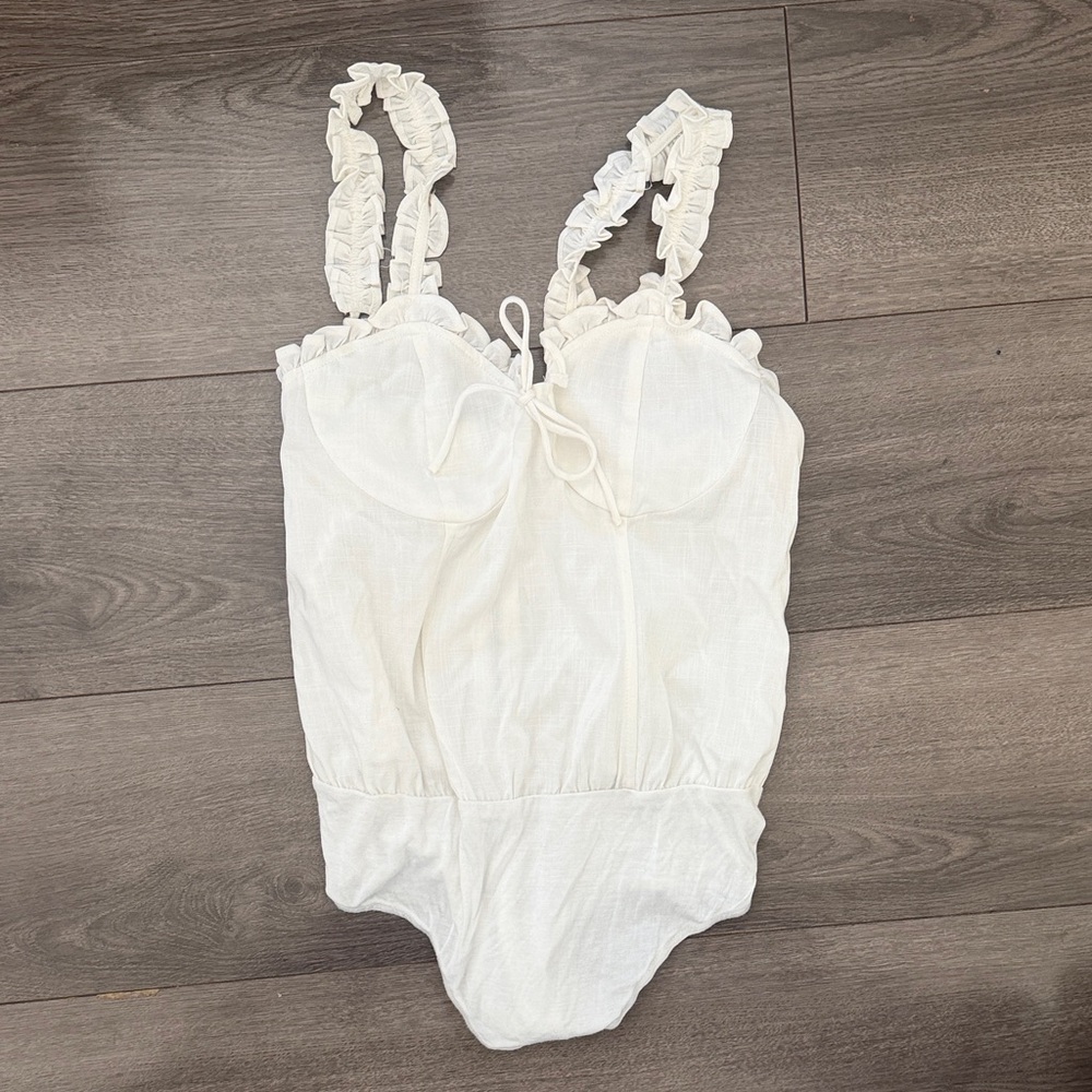 Elegant White Ruffled Bodysuit